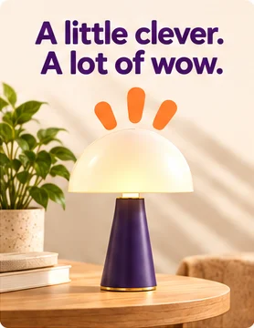 A plum desk lamp on a wooden side table